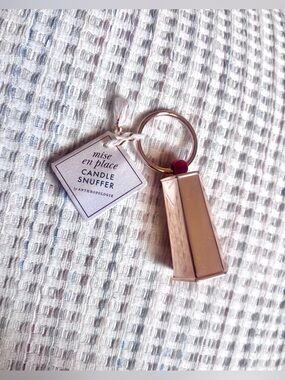 Anthropologie Rose Gold Candle Snuffer Keyring with Burgundy Accent